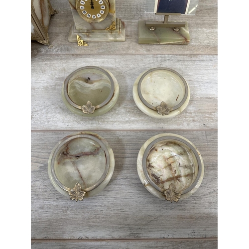 17 - Fifteen onyx and gilt metal items to include rotary dial telephone, jewellery box, table lighters, p... 