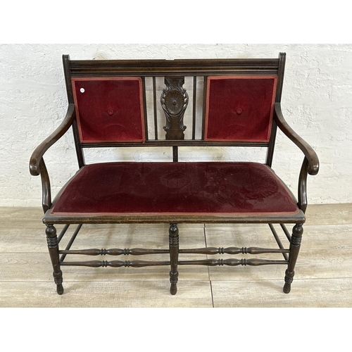 173 - An Edwardian carved beech and red fabric upholstered two seater parlour sofa - approx. 97cm high x 1... 