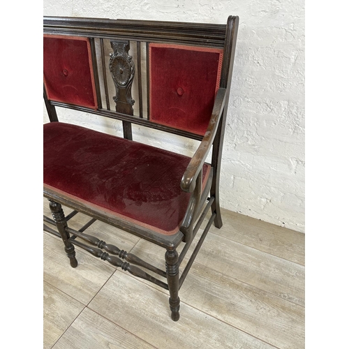 173 - An Edwardian carved beech and red fabric upholstered two seater parlour sofa - approx. 97cm high x 1... 