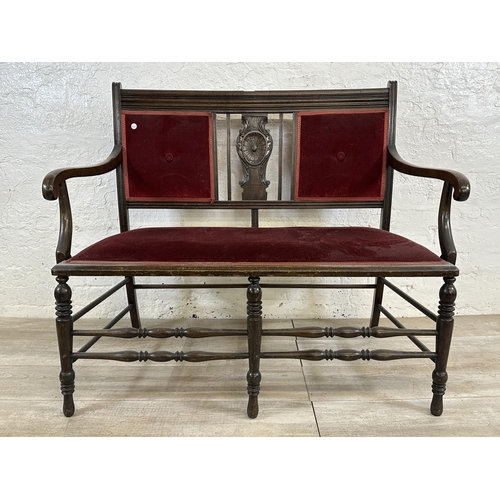 173 - An Edwardian carved beech and red fabric upholstered two seater parlour sofa - approx. 97cm high x 1... 