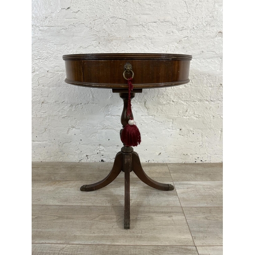 175 - An American Imperial of Grand Rapids mahogany drum table - approx. 67cm high x 52cm diameter