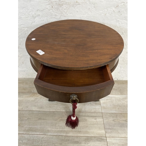 175 - An American Imperial of Grand Rapids mahogany drum table - approx. 67cm high x 52cm diameter