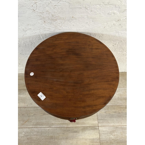 175 - An American Imperial of Grand Rapids mahogany drum table - approx. 67cm high x 52cm diameter