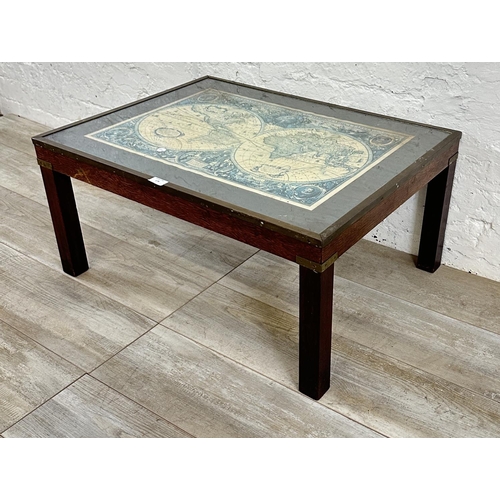 178 - A mid 20th century mahogany and brass banded coffee table with glass top and printed map design - ap... 