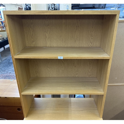 184 - A modern oak effect bookcase - approx. 174cm high x 79cm wide x 43cm deep