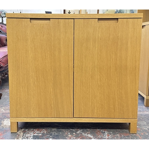 185 - A modern oak effect sideboard - approx. 74cm high x 80cm wide x 42cm deep