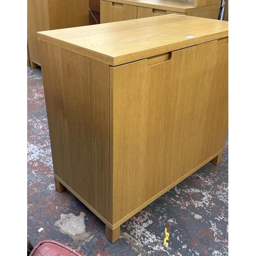 185 - A modern oak effect sideboard - approx. 74cm high x 80cm wide x 42cm deep