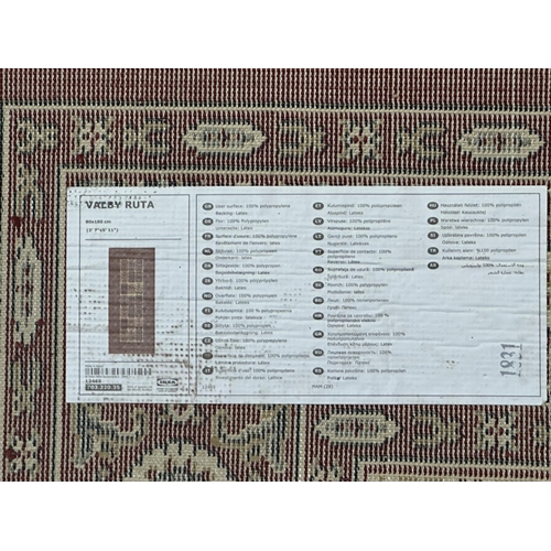 24 - An IKEA Valby Ruta rug - approx. 180cm x 80cm