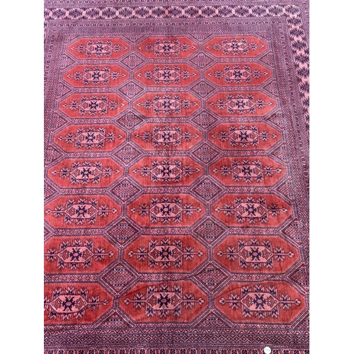 24A - A mid 20th century Bokhara rug - approx. 190cm x 130cm