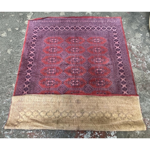 24A - A mid 20th century Bokhara rug - approx. 190cm x 130cm