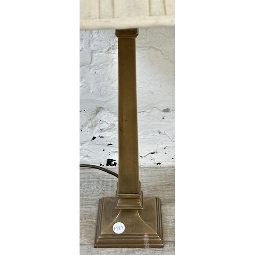 26 - A pair of Marks and Spencer brushed brass table lamps - approx. 60cm high including shades