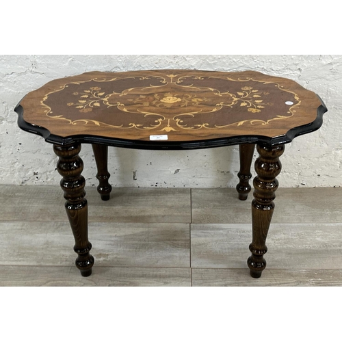 29 - An Italian Sorrento marquetry inlaid walnut and ebonised serpentine side table - approx. 44cm high x... 