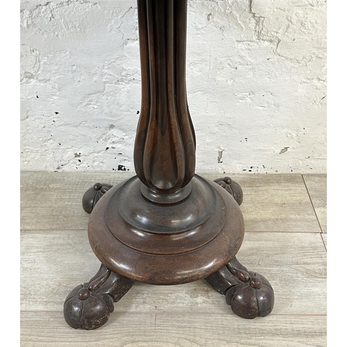 3 - A 19th century rosewood teapoy on quatrefoil base - approx. 74cm high x 51cm wide x 47cm deep