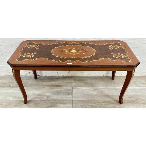 30 - An Italian Sorrento marquetry inlaid walnut coffee table - approx. 49cm high x 47cm wide x 105cm lon... 