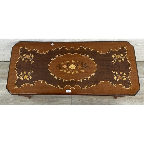 30 - An Italian Sorrento marquetry inlaid walnut coffee table - approx. 49cm high x 47cm wide x 105cm lon... 