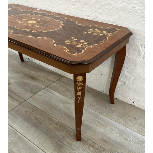 30 - An Italian Sorrento marquetry inlaid walnut coffee table - approx. 49cm high x 47cm wide x 105cm lon... 