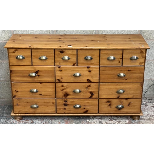 35 - A pine chest of drawers - approx. 80cm high x 133cm wide x 42cm deep