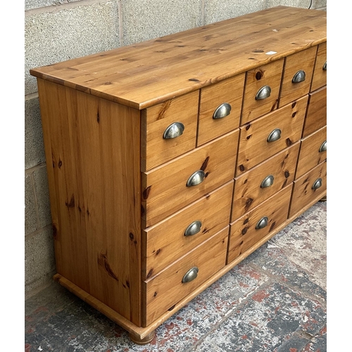 35 - A pine chest of drawers - approx. 80cm high x 133cm wide x 42cm deep