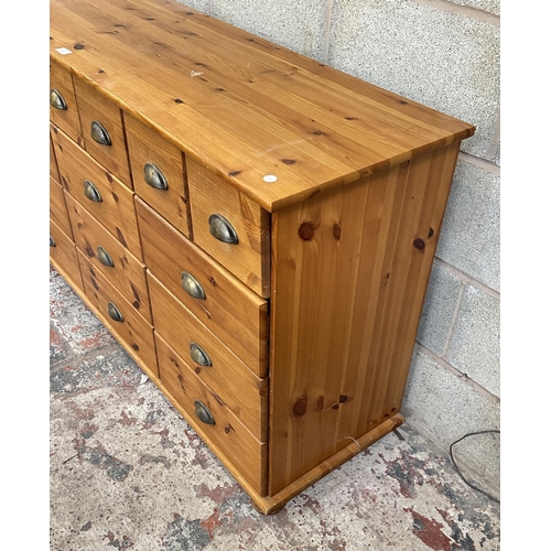 35 - A pine chest of drawers - approx. 80cm high x 133cm wide x 42cm deep