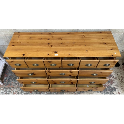 35 - A pine chest of drawers - approx. 80cm high x 133cm wide x 42cm deep