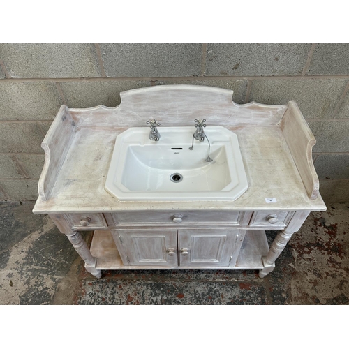 36 - A Victorian style white painted pine wash stand with fitted Savoy ceramic sink - approx. 96cm high x... 