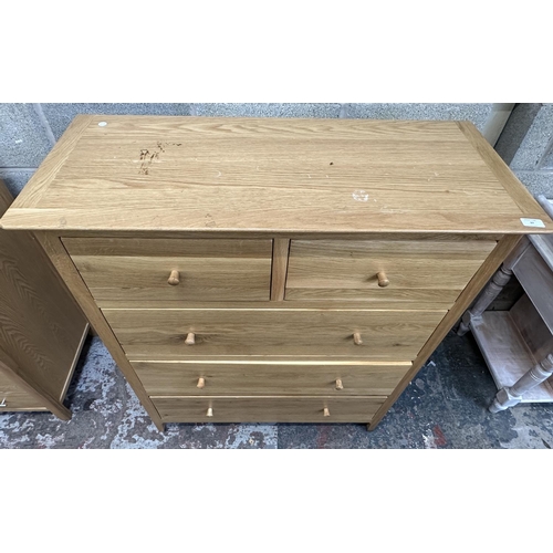 37 - A modern oak chest of drawers - approx. 120cm high x 99.5cm wide x 42cm deep