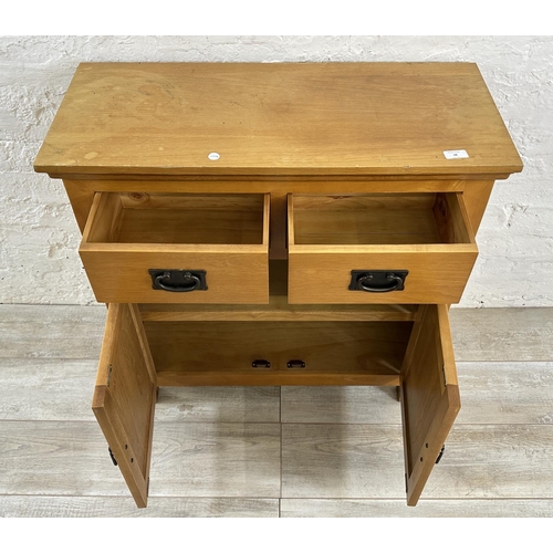 38 - A modern oak sideboard - approx. 80cm high x 80cm wide x 34cm deep