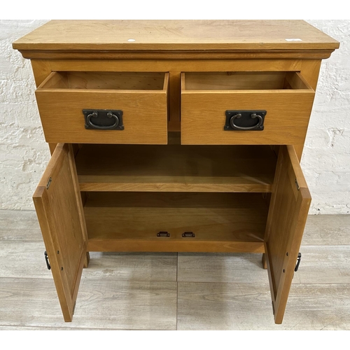 38 - A modern oak sideboard - approx. 80cm high x 80cm wide x 34cm deep