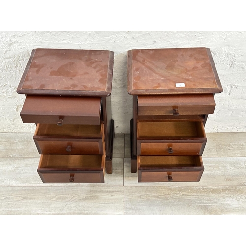 40 - A pair of Stag Minstrel mahogany bedside cabinets - approx. 66cm high x 40cm wide x 32cm deep