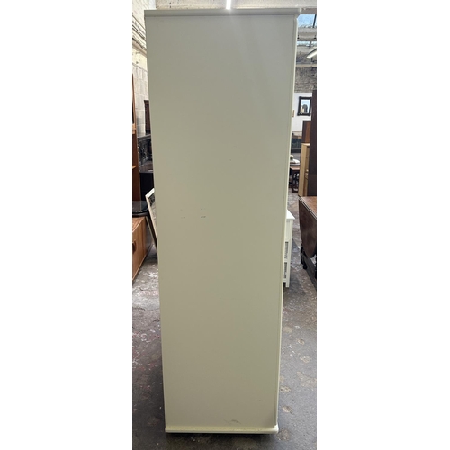 44A - A modern white laminate triple wardrobe - approx. 189cm high x 115cm wide x 55cm deep