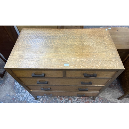 53 - A mid 20th century oak chest of drawers - approx. 95cm high x 91cm wide x 49cm deep