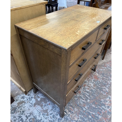 53 - A mid 20th century oak chest of drawers - approx. 95cm high x 91cm wide x 49cm deep