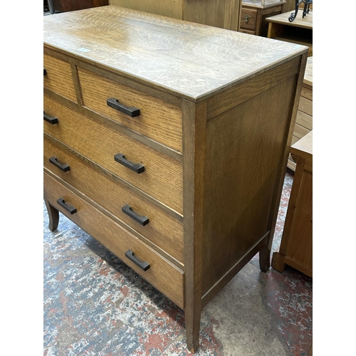 53 - A mid 20th century oak chest of drawers - approx. 95cm high x 91cm wide x 49cm deep