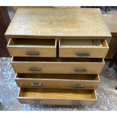 53 - A mid 20th century oak chest of drawers - approx. 95cm high x 91cm wide x 49cm deep