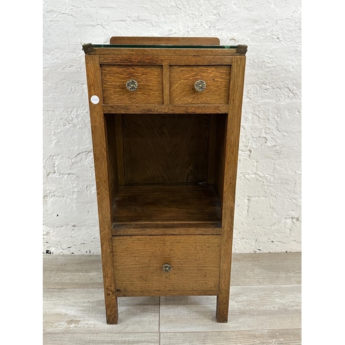 54 - A 1930s oak bedside cabinet - approx. 79cm high x 36cm wide x 35cm deep