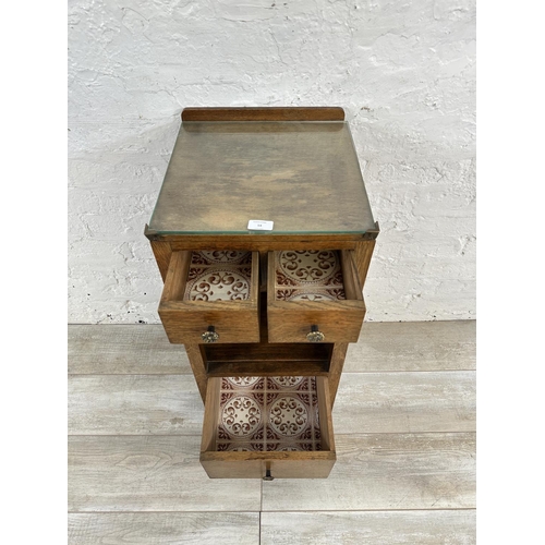 54 - A 1930s oak bedside cabinet - approx. 79cm high x 36cm wide x 35cm deep