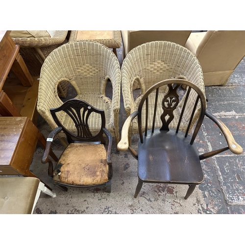 58 - Eleven pieces of furniture to include Ercol Fleur De Lys elm and beech carver dining chair, two wick... 