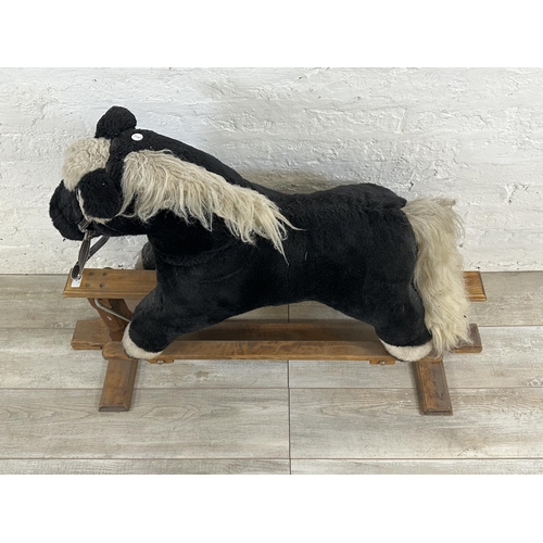 59 - A modern plush rocking horse on beech stand - approx. 80cm high x 47cm wide x 118cm deep