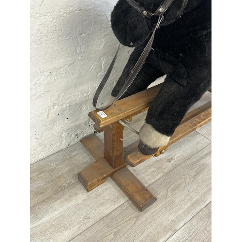 59 - A modern plush rocking horse on beech stand - approx. 80cm high x 47cm wide x 118cm deep