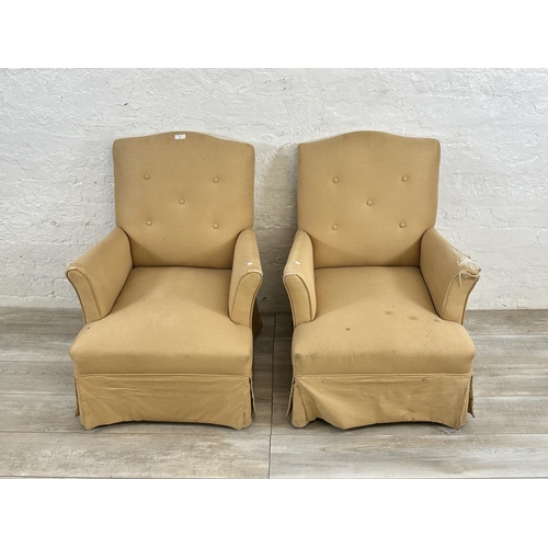 64 - A pair of mid 20th century fabric upholstered armchairs