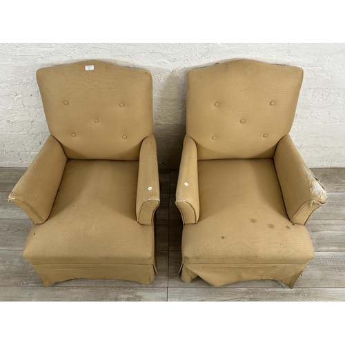 64 - A pair of mid 20th century fabric upholstered armchairs