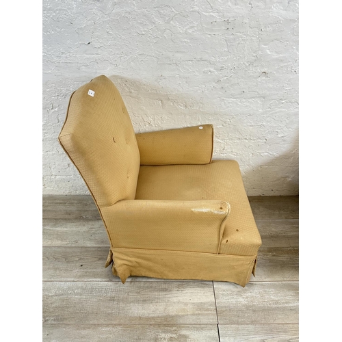 64 - A pair of mid 20th century fabric upholstered armchairs