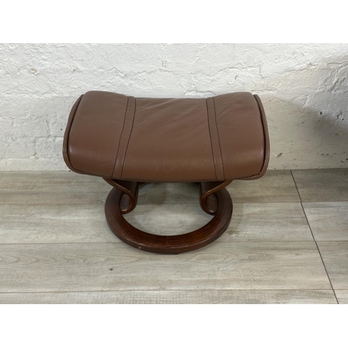 67 - An Ekornes Stressless brown leather and bentwood swivel reclining armchair and footstool