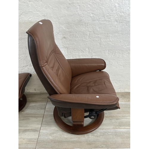 67 - An Ekornes Stressless brown leather and bentwood swivel reclining armchair and footstool