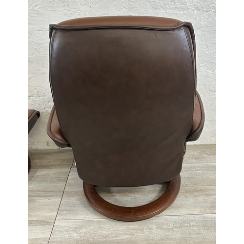 67 - An Ekornes Stressless brown leather and bentwood swivel reclining armchair and footstool