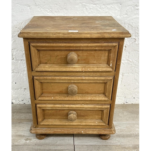 71 - A pine bedside chest of drawers - approx. 60cm high x 46cm wide x 38cm deep