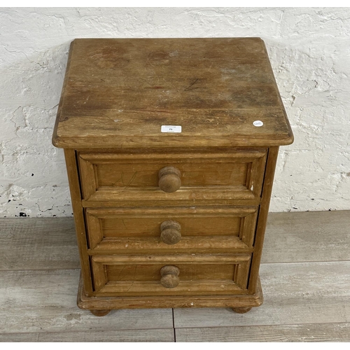 71 - A pine bedside chest of drawers - approx. 60cm high x 46cm wide x 38cm deep