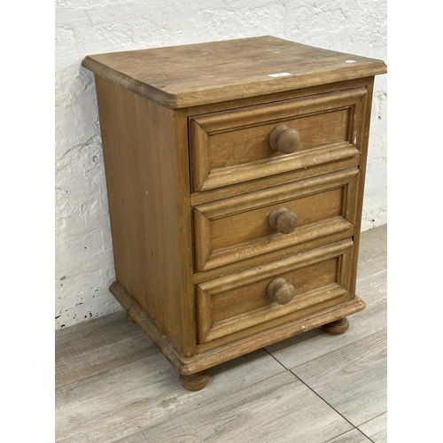 71 - A pine bedside chest of drawers - approx. 60cm high x 46cm wide x 38cm deep