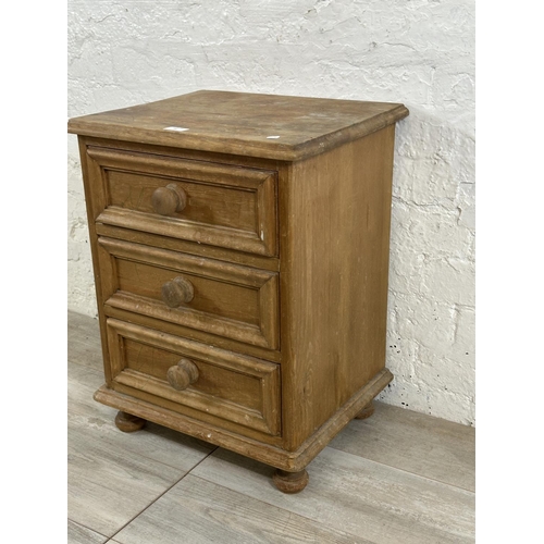 71 - A pine bedside chest of drawers - approx. 60cm high x 46cm wide x 38cm deep