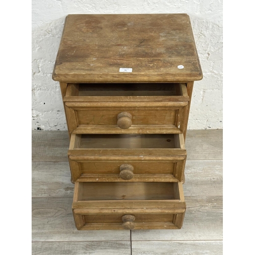 71 - A pine bedside chest of drawers - approx. 60cm high x 46cm wide x 38cm deep